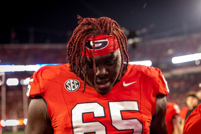 Georgia Bulldogs tackle Amarius Mims (65) reminiscing their win over Ole Miss on Mov. 11, 2023. (Brooks Austin / Dawgs Daily).